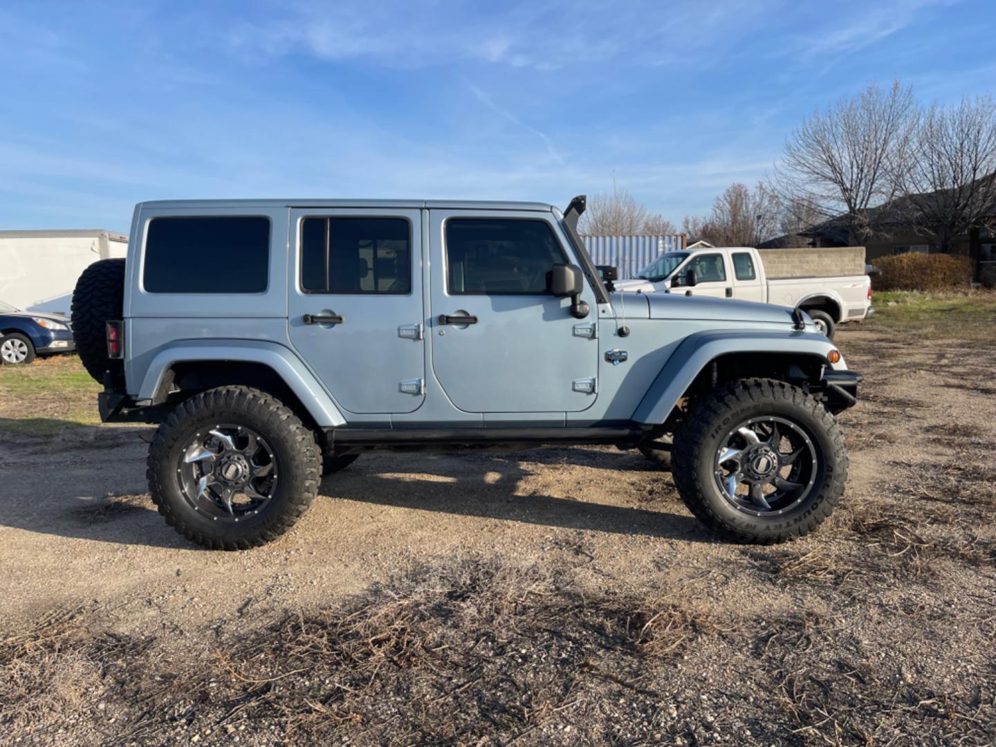 2012 Blue /Black Jeep Wrangler Artic (1C4HJWEG2CL) with an 3.6 V6 engine, AT transmission, located at 813 E Fairview Ave, Meridian , ID, 83642, (208) 336-8230, 43.618851, -116.384010 - Photo#4